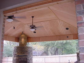 Outdoor Kitchen With Round Attached Fireplace